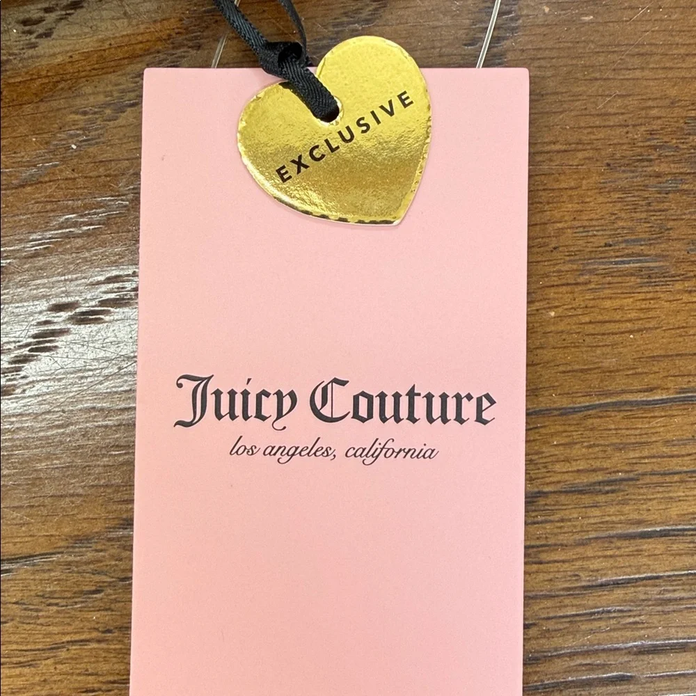 Juicy Couture Love & Crown Logo Wristlet. Zip around. Brown and tan color.
